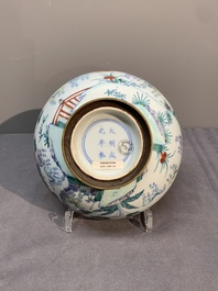 A Chinese doucai 'deer' bowl with gilt bronze stand, Chenghua mark, 18th C.