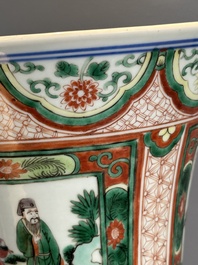 A Chinese wucai 'gu' vase with Buddhist lions, peony scrolls and figures, 19th C.
