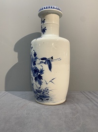 A Chinese blue and white vase with birds among flowering branches, 19th C.