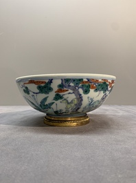 A Chinese doucai 'deer' bowl with gilt bronze stand, Chenghua mark, 18th C.