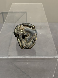 A Chinese bronze camel-form paperweight and a peach-shaped covered censer, 19th C.