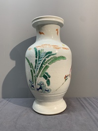 A Chinese famille rose 'warriors on horseback' vase, 18/19th C.