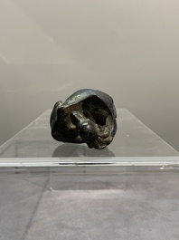 A Chinese bronze camel-form paperweight and a peach-shaped covered censer, 19th C.