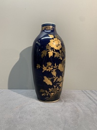 A Chinese powder blue and gilt vase with a pheasant among flowering branches, Qianlong