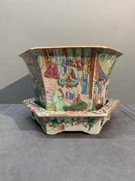 A Chinese Canton famille rose hexagonal jardini&egrave;re and stand with narrative design, 19th C.
