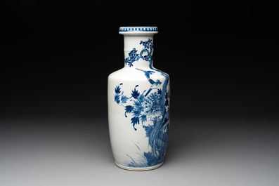 A Chinese blue and white vase with birds among flowering branches, 19th C.