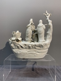 A Chinese Dehua blanc de Chine group of female immortals on a boat, Republic
