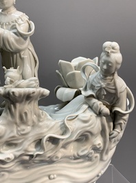 A Chinese Dehua blanc de Chine group of female immortals on a boat, Republic