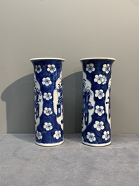 A pair of Chinese blue and white 'gu' vases, three jars, a plate and a plaque, Kangxi mark, 19th C.