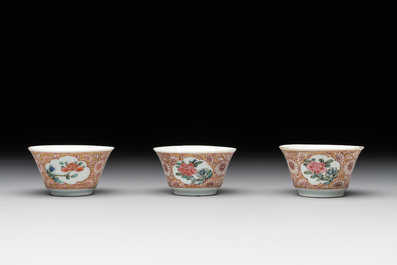 Seven Chinese blue, white and famille rose cups, six saucers and two English-decorated jarlets, Kangxi/Yongzheng
