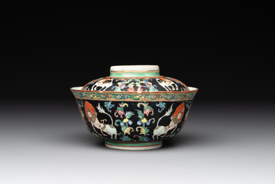 A rare Chinese black-ground Bencharong 'Thepphanom' bowl and cover for the Thai market, He Yaoji 何耀記 mark, 19th C.