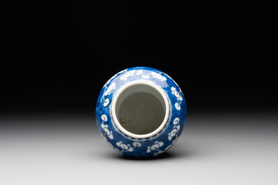 A pair of Chinese blue and white 'gu' vases, three jars, a plate and a plaque, Kangxi mark, 19th C.
