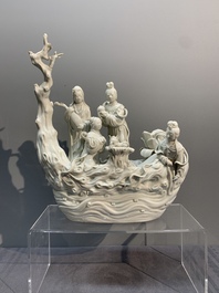 A Chinese Dehua blanc de Chine group of female immortals on a boat, Republic