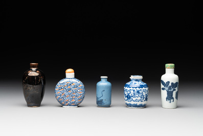 Five Chinese blue and white, iron-red and mirror-black-glazed snuff bottles, Qianlong mark, 19th C.