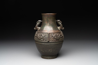 A Chinese silver-inlaid archaistic bronze vase, Da Tang Yuan Nian 大唐元年 mark, 17/18th C.