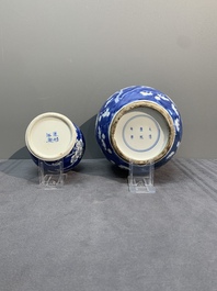 A pair of Chinese blue and white 'gu' vases, three jars, a plate and a plaque, Kangxi mark, 19th C.