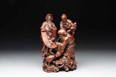 A Chinese carved wooden 'Fu Lu Shou' group, 19/20th C.