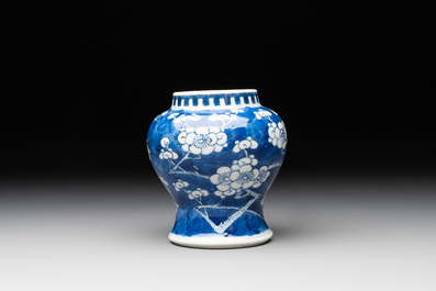 A pair of Chinese blue and white 'gu' vases, three jars, a plate and a plaque, Kangxi mark, 19th C.