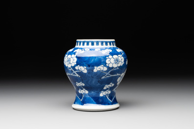 A pair of Chinese blue and white 'gu' vases, three jars, a plate and a plaque, Kangxi mark, 19th C.