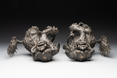 A pair of fine Chinese bronze Buddhist lions, 17/18th C.