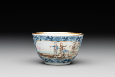 A Chinese export famille rose cup and saucer with a herring merchant, Qianlong