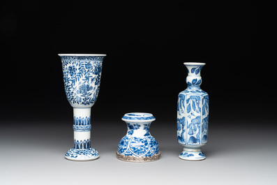 A Chinese blue and white goblet, a salt and a vase, Kangxi