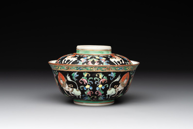 A rare Chinese black-ground Bencharong 'Thepphanom' bowl and cover for the Thai market, He Yaoji 何耀記 mark, 19th C.