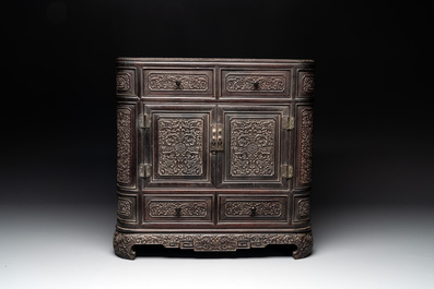A Chinese zitan wood 'duo bao ge' cabinet of curiosities with carved floral design, 19th C.