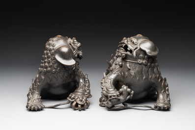 A pair of fine Chinese bronze Buddhist lions, 17/18th C.