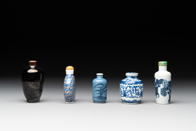 Five Chinese blue and white, iron-red and mirror-black-glazed snuff bottles, Qianlong mark, 19th C.