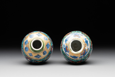 Seven Chinese blue, white and famille rose cups, six saucers and two English-decorated jarlets, Kangxi/Yongzheng