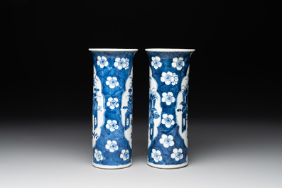 A pair of Chinese blue and white 'gu' vases, three jars, a plate and a plaque, Kangxi mark, 19th C.