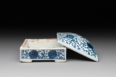 A Chinese blue and white square 'lotus scroll' box and cover, Qianlong