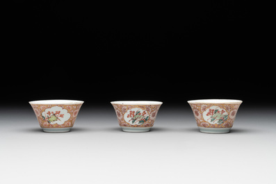 Seven Chinese blue, white and famille rose cups, six saucers and two English-decorated jarlets, Kangxi/Yongzheng