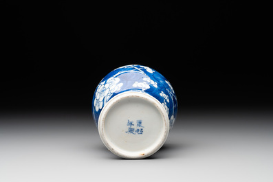 A pair of Chinese blue and white 'gu' vases, three jars, a plate and a plaque, Kangxi mark, 19th C.