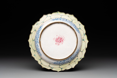 A Chinese Canton enamel 'foreigners' bowl and cover and a 'erotical subject' plate, Yongzheng/Qianlong