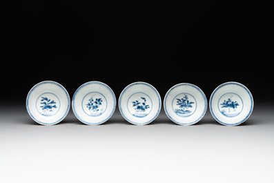 Five Chinese caf&eacute;-au-lait-ground blue and white cups and four saucers, conical shell mark, Kangxi