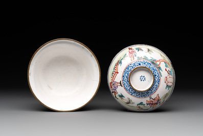 A Chinese Canton enamel 'foreigners' bowl and cover and a 'erotical subject' plate, Yongzheng/Qianlong