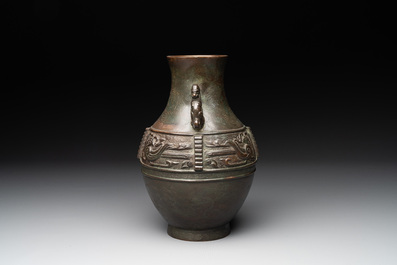 A Chinese silver-inlaid archaistic bronze vase, Da Tang Yuan Nian 大唐元年 mark, 17/18th C.