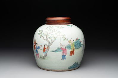 A Chinese famille rose '100 boys' jar and wooden cover, 19th C.