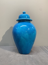 Three Chinese turquoise-glazed covered vases and a lavender-blue-glazed vase, Kangxi mark, 19/20th C.