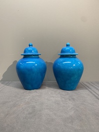 Three Chinese turquoise-glazed covered vases and a lavender-blue-glazed vase, Kangxi mark, 19/20th C.