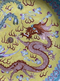 A Chinese famille rose yellow-ground 'dragon and phoenix' dish for the Straits or Peranakan market, Qianlong mark, 19th C.