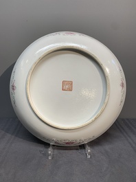 A Chinese famille rose yellow-ground 'dragon and phoenix' dish for the Straits or Peranakan market, Qianlong mark, 19th C.