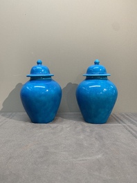 Three Chinese turquoise-glazed covered vases and a lavender-blue-glazed vase, Kangxi mark, 19/20th C.