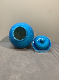 Three Chinese turquoise-glazed covered vases and a lavender-blue-glazed vase, Kangxi mark, 19/20th C.