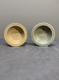 A Chinese Longquan celadon stem cup and two saucers, Ming