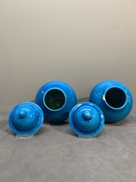 Three Chinese turquoise-glazed covered vases and a lavender-blue-glazed vase, Kangxi mark, 19/20th C.