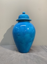 Three Chinese turquoise-glazed covered vases and a lavender-blue-glazed vase, Kangxi mark, 19/20th C.