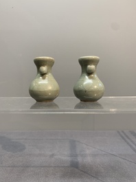 A pair of Chinese Longquan celadon miniature 'touhu' vases, Song/Yuan